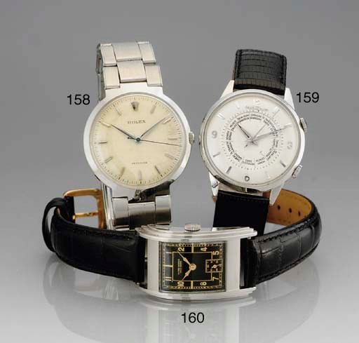 JAEGER-LECOULTRE. A STAINLESS STEEL WORLD TIME WRISTWATCH WITH ALARM AND SWEEP SECONDS