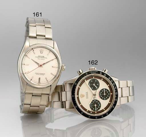 ROLEX. A STAINLESS STEEL CHRONOGRAPH WRISTWATCH WITH BRACELET
