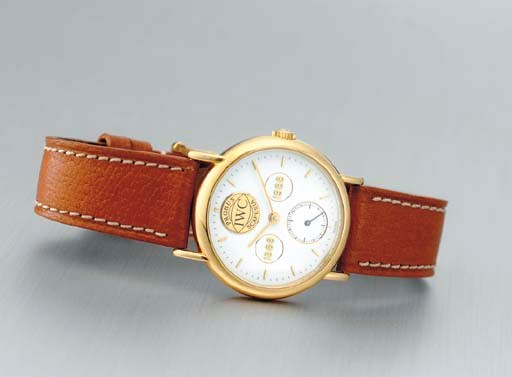 IWC. A LIMITED EDITION 18K GOLD ANNIVERSARY WRISTWATCH