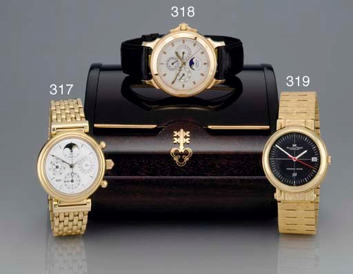 IWC. A VERY RARE 18K GOLD AUTOMATIC WRISTWATCH WITH SWEEP SECONDS, DATE, COMPASS AND BRACELET