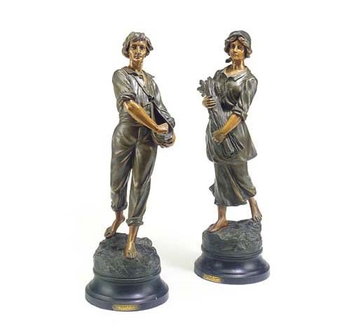 A pair of French patinated spelter figures