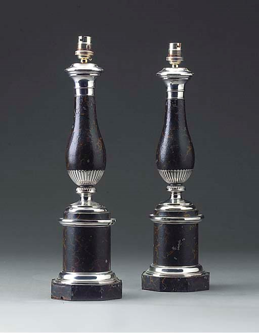A pair of French silvered tole and metal table lamps