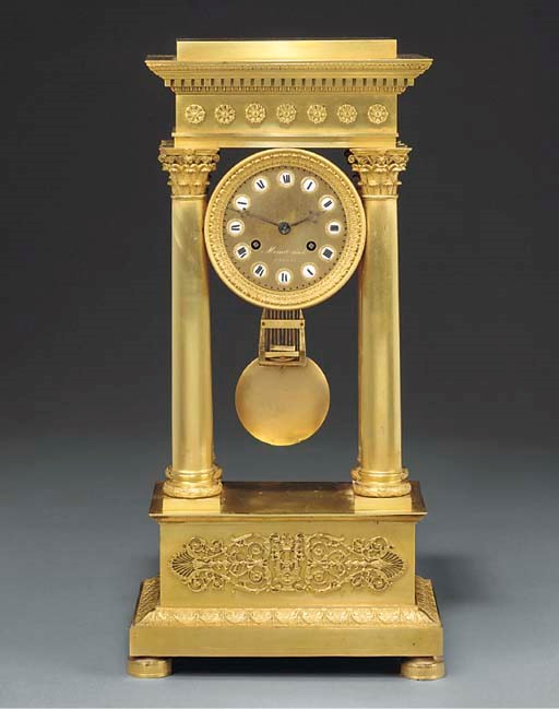 A RESTAURATION GILT BRONZE PORTICO CLOCK