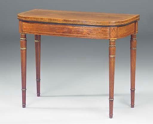 A REGENCY ROSEWOOD AND SATINWOOD CROSSBANDED AND LINE INLAID CARD TABLE