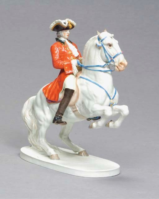 A MEISSEN PORCELAIN FIGURAL GROUP OF A RIDER AND HORSE,