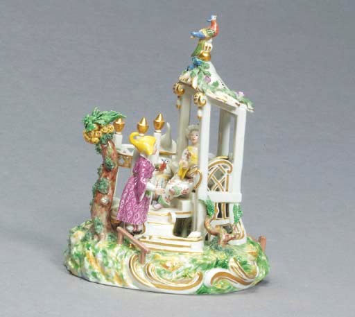 A CONTINENTAL PORCELAIN FIGURAL GROUP,