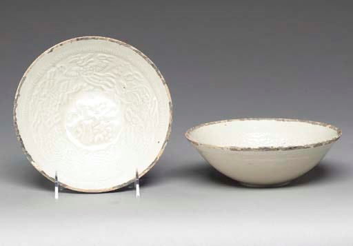 A PAIR OF MOULDED QINGBAI BOWLS,
