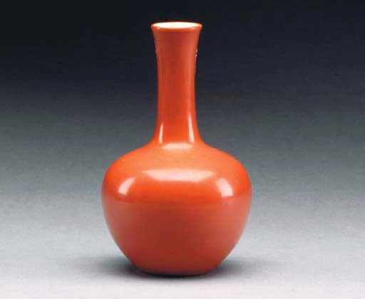A CHINESE PORCELAIN CORAL-RED-GLAZED BOTTLE VASE,