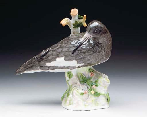 A PAIR OF CONTINENTAL PORCELAIN MODELS OF WATER BIRDS,
