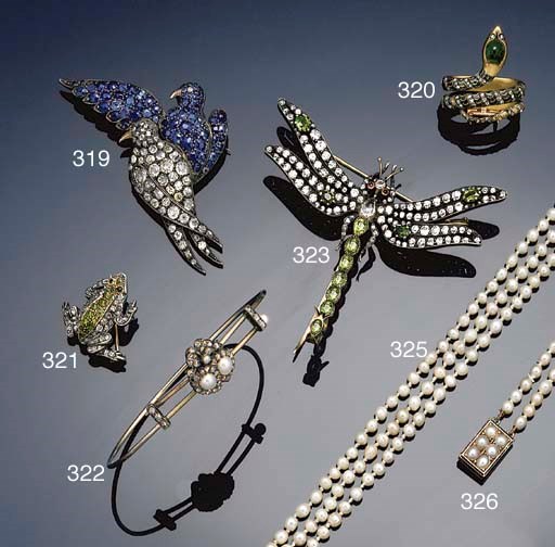 A late Victorian diamond and demantoid garnet frog brooch