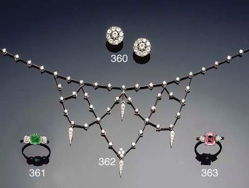A pair of diamond cluster earclips
