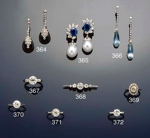 A pair of sapphire, diamond and south sea cultured pearl earrings