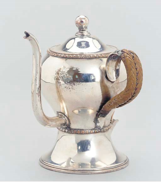 A SILVER-PLATE ARGYLL