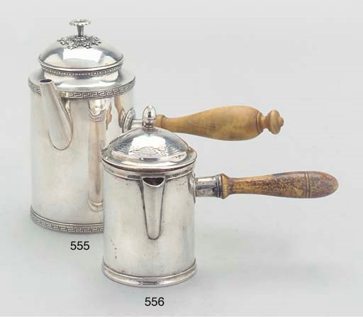 A GERMAN SILVER HOT MILK JUG