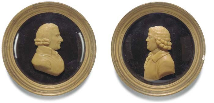 A GEORGE III CREAM WAX PORTRAIT OF A GENTLEMAN
