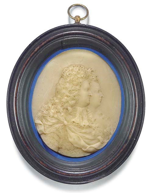 A CREAM WAX DOUBLE PORTRAIT RELIEF OF WILLIAM AND MARY