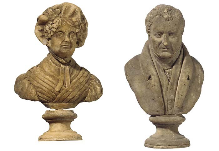 A PAIR OF REGENCY WAX BUSTS OF A GENTLEMAN AND LADY
