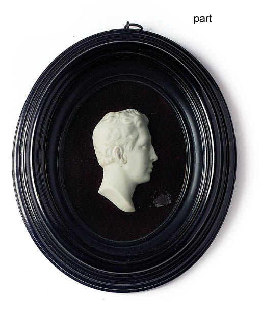 A WHITE WAX PORTRAIT RELIEF OF A GENTLEMAN
