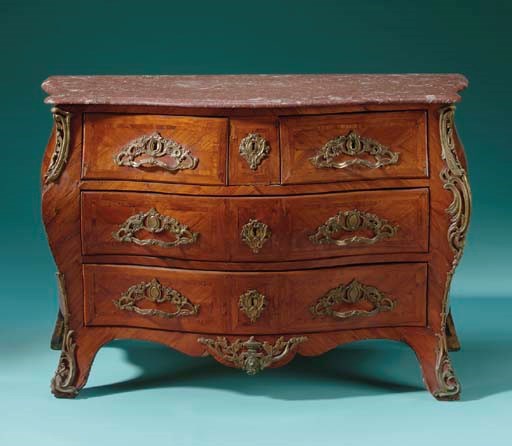 A LOUIS XV ORMOLU-MOUNTED KINGWOOD COMMODE