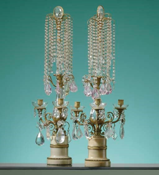 A PAIR OF NORTH EUROPEAN ORMOLU, WHITE MARBLE, ROCK CRYSTAL, AMETHYST CRYSTAL AND CUT-GLASS THREE-LIGHT CANDELABRA