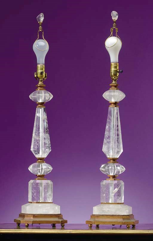 A PAIR OF ROCK CRYSTAL AND GILTWOOD LAMPS