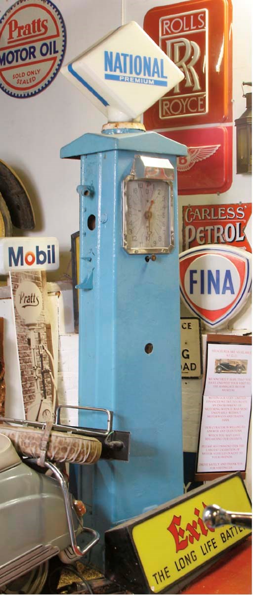 National "Premium" - A pre-war electric petrol-pump; over-painted blue livery; having glass pump globe to top; lacking hose and rear cover panel; c.1930s.