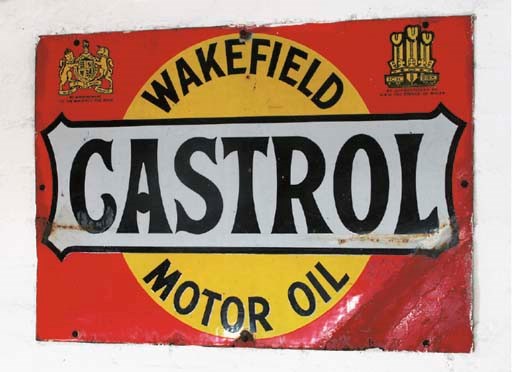Castrol - An early pre-war enamel advertising sign; red, yellow white and black lettering design; double-sided, flange-mounting; c.1920s. 15x24ins