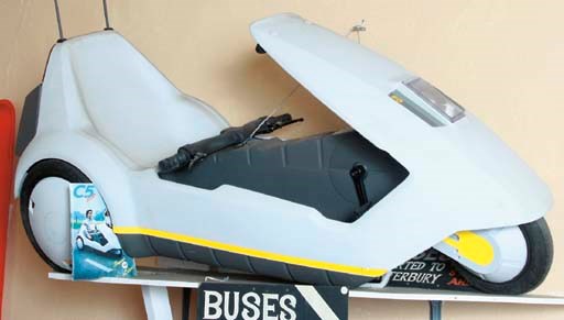 Sinclair C5 - An electrically propelled tricycle; designed by Sir Clive Sinclair; unused, as new, display condition; together with its original delivery packing-crate; c.1970s.