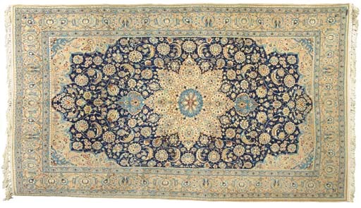 A PART SILK NAIN RUG