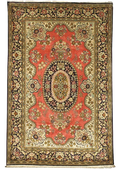 A SILK QUM RUG