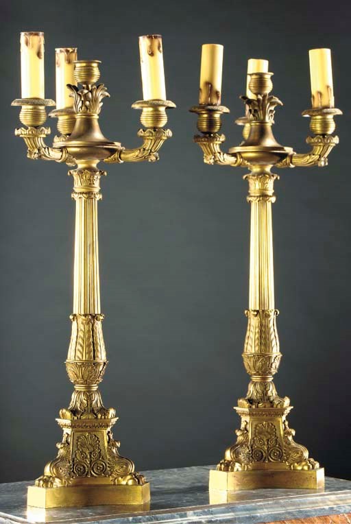 A pair of Restauration ormolu four-light candelabra
