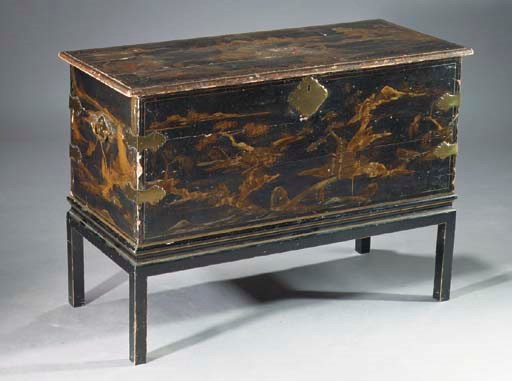 A North European brass-mounted black and gilt-japanned chest