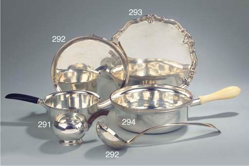 An English silver salver and a silver soup ladle