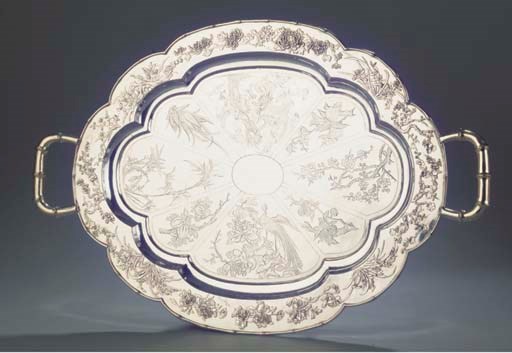 A Chinese silver tray on four feet