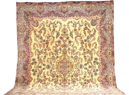 A KIRMAN CARPET,