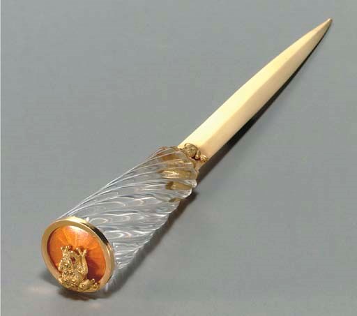 A ROCK CRYSTAL, RUBY, COLORED DIAMOND, ENAMEL AND GOLD LETTER OPENER, BY ANDREAS VON ZADORA