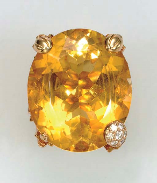 A CITRINE, DIAMOND AND 18K GOLD RING
