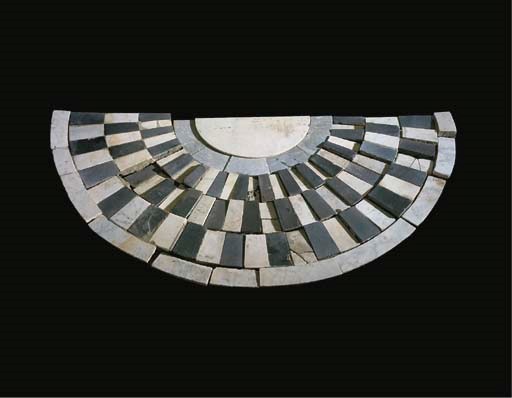 A white and black marble and slate tiled floor