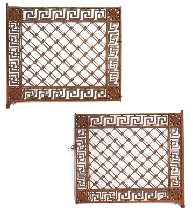 A pair of Regency cast and wrought iron gates