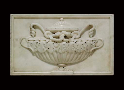 A George III statuary marble chimneypiece tablet