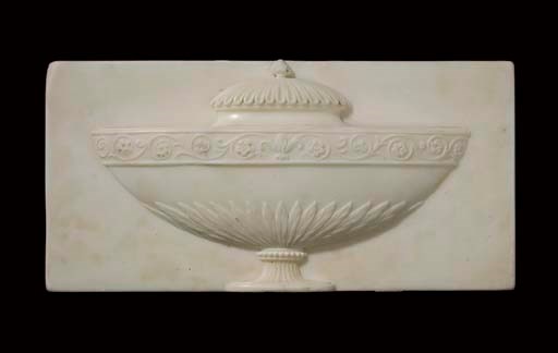 A George III statuary marble chimneypiece tablet