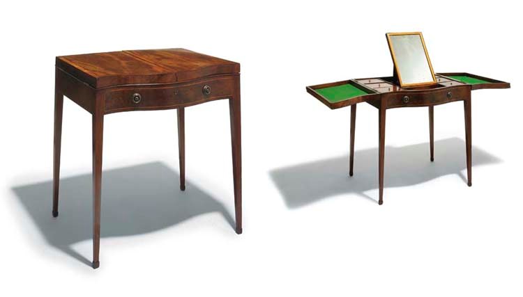 A George III mahogany tulipwood crossbanded and inlaid serpentine front gentleman's enclosed dressing table