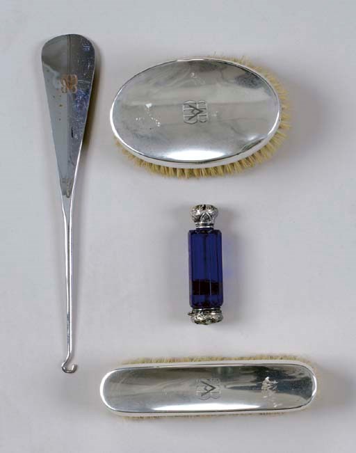 A SILVER-MOUNTED DRESSER SET**,
