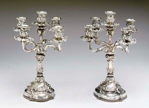 A PAIR OF ITALIAN SILVER FIVE-LIGHT CANDELABRA,