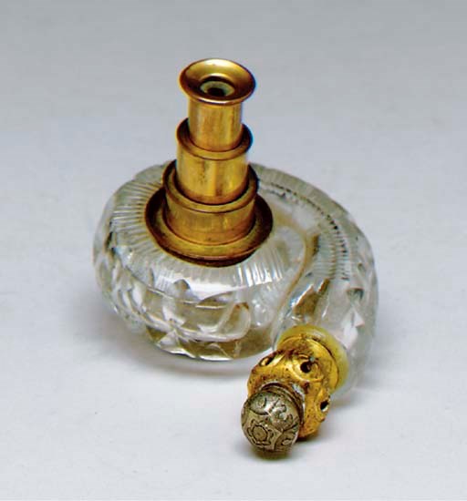 A SMALL CONTINENTAL GLASS PERFUME BOTTLE AND MONOCLE,