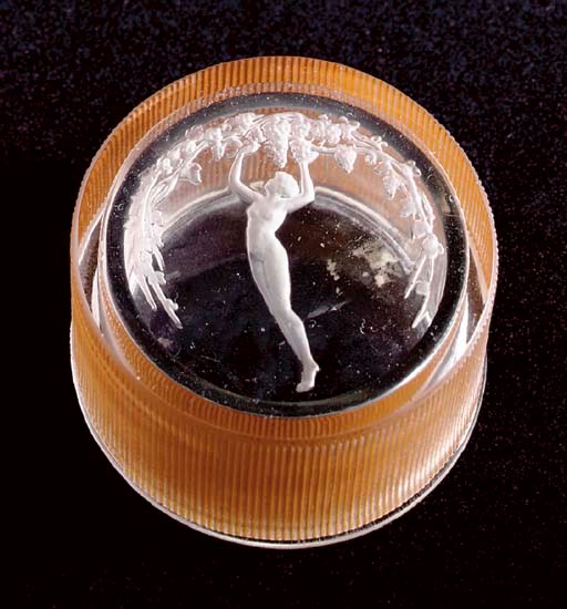 'UNE FIGURINE ET RAISINS,' A LALIQUE CLEAR, FROSTED AND SEPIA-STAINED CIRCULAR GLASS BOX AND COVER,