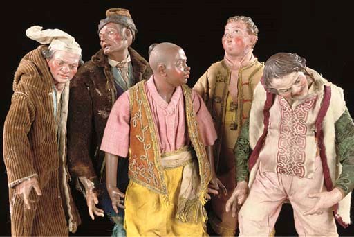 A GROUP OF FIVE SIMILAR NEAPOLITAN CARVED AND POLYCHROME WOOD AND TERRACOTTA CRECHE FIGURES