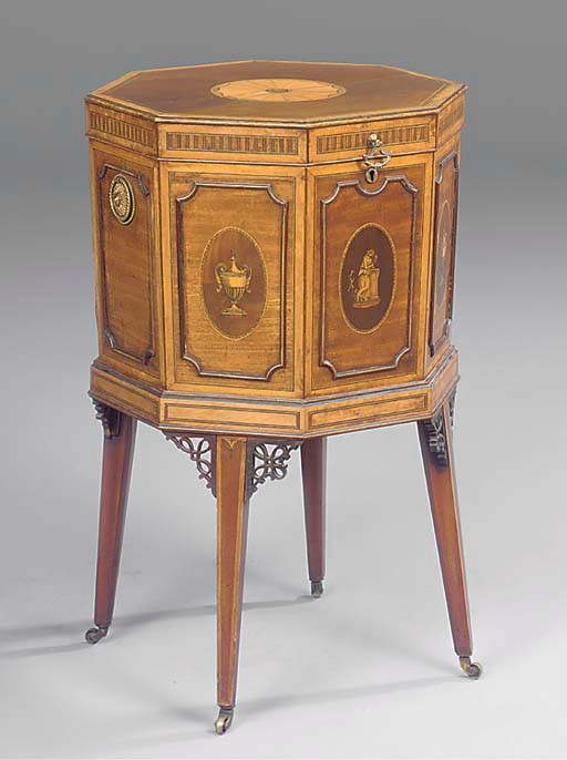 A MAHOGANY, SATINWOOD AND MARQUETRY OCTAGONAL CELLARETTE
