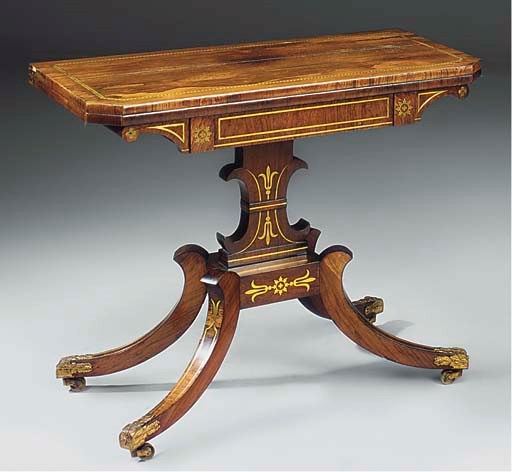 A REGENCY ROSEWOOD AND BRASS INLAID CARD TABLE