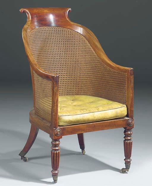 A LATE REGENCY MAHOGANY LIBRARY BERGERE